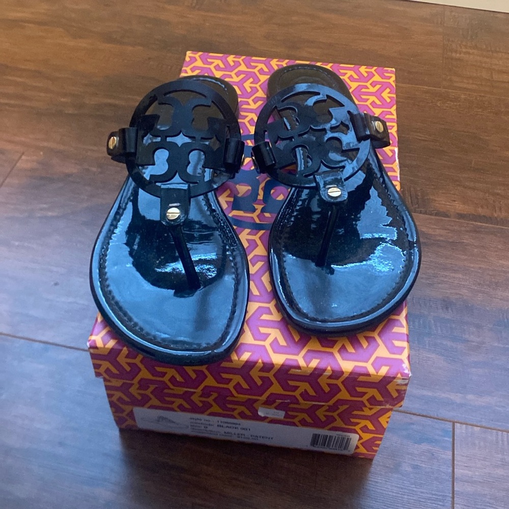 Used - Authentic Tory Burch Miller Patent thong in Black. Size 9.